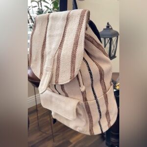 “Universal Tread” Striped Canvas Backpack